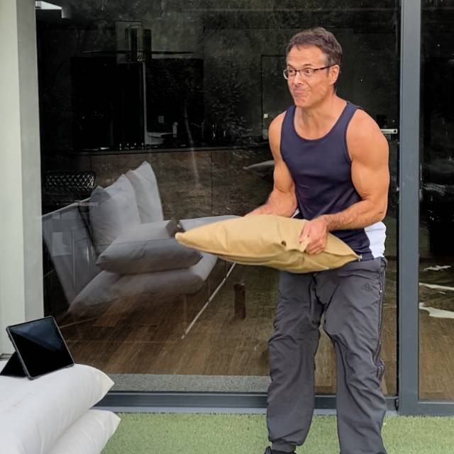 Working out with a 60lb sandbag